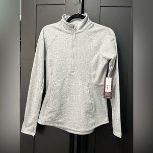 NEW! Half zip mock neck pullover with thumb hole.